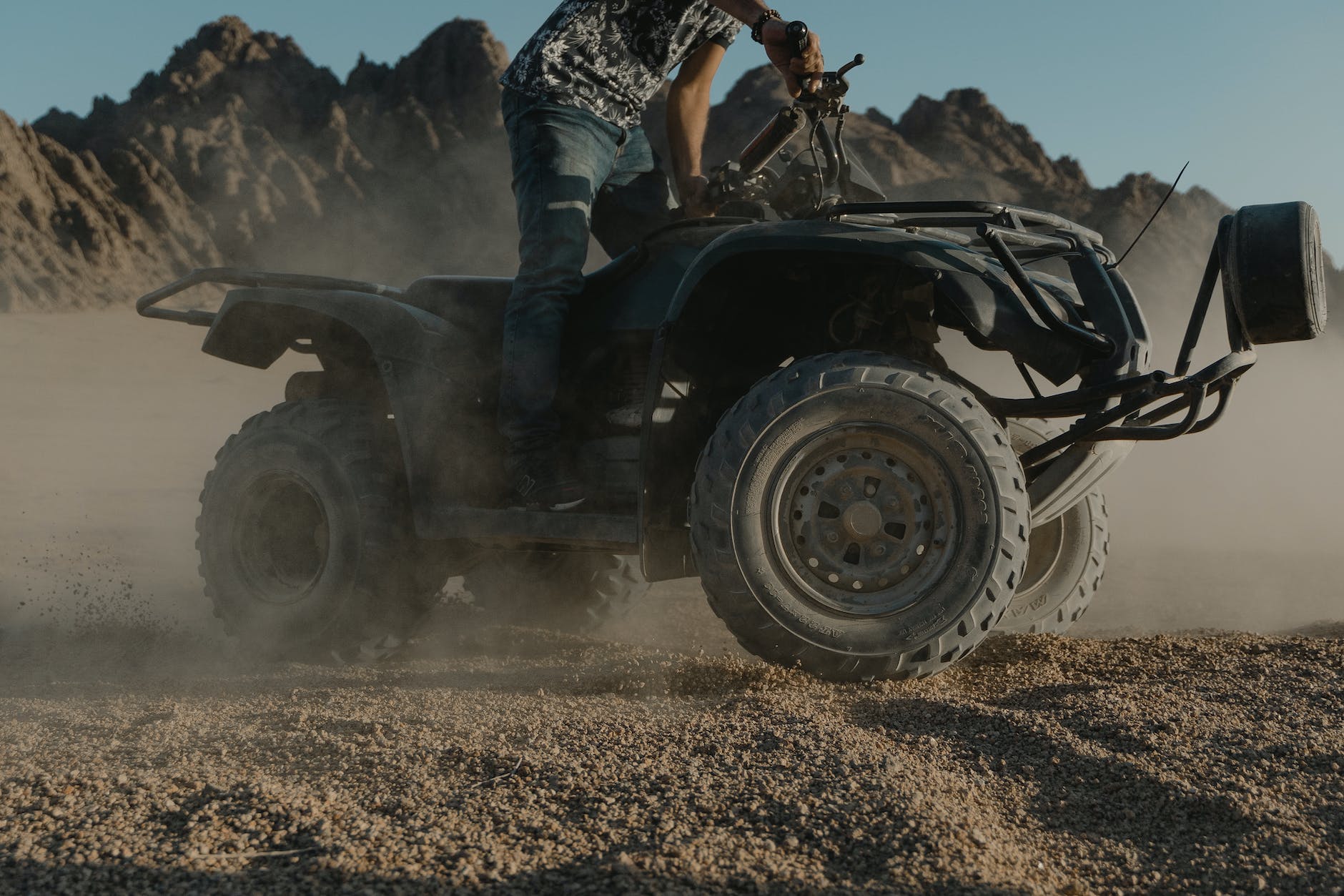 a person riding an atv
