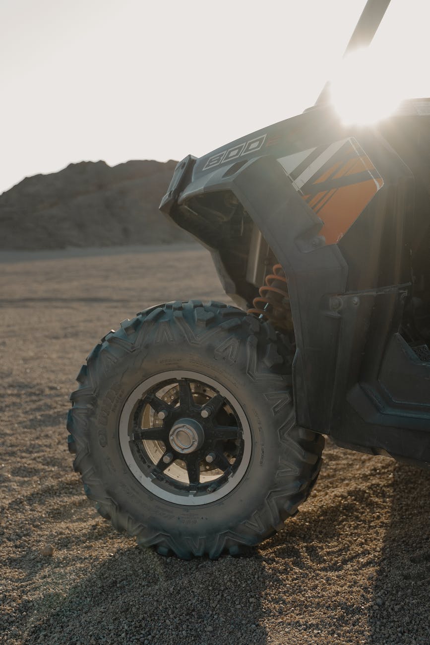 an all terrain vehicle on sand