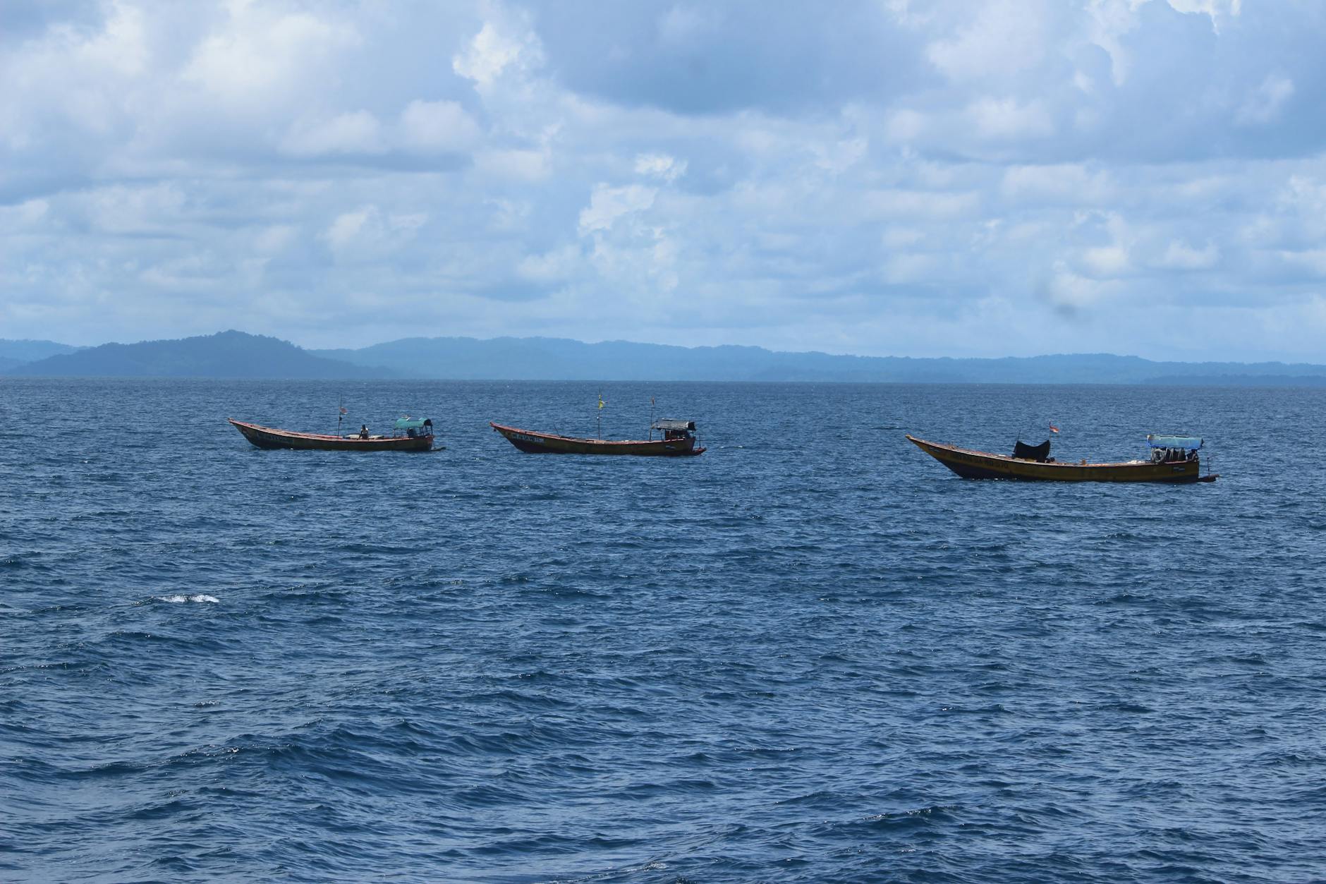 fishing boats in blue sea
